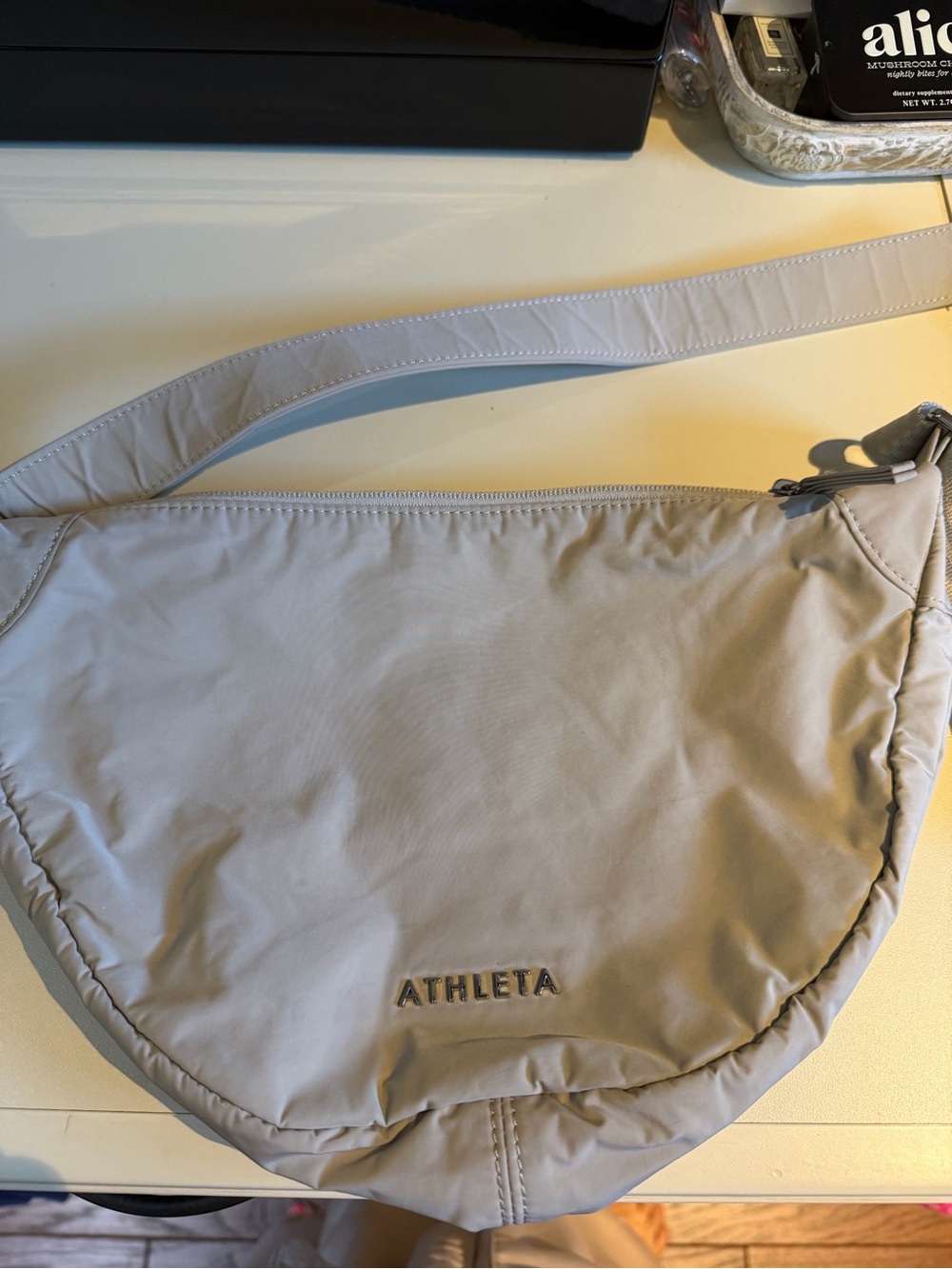 Athleta Pale Gray Crescent Shoulder Bag